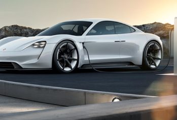 Porsche unveils fast, low-cost ‘pit stop’ EV charging stations